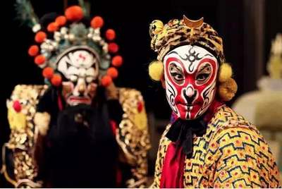 golden and silver facial makeup: The image of Sun Wu-Kong in opera.