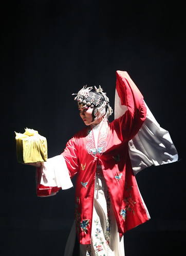 Informal dress: The casual wear in traditional opera costumes.