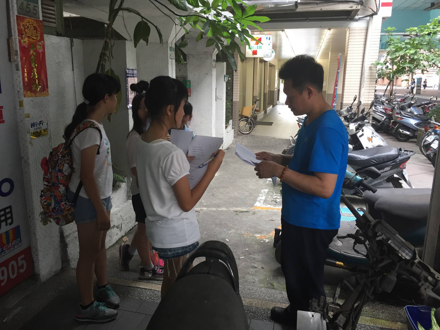 Conducting a questionnaire survey.
