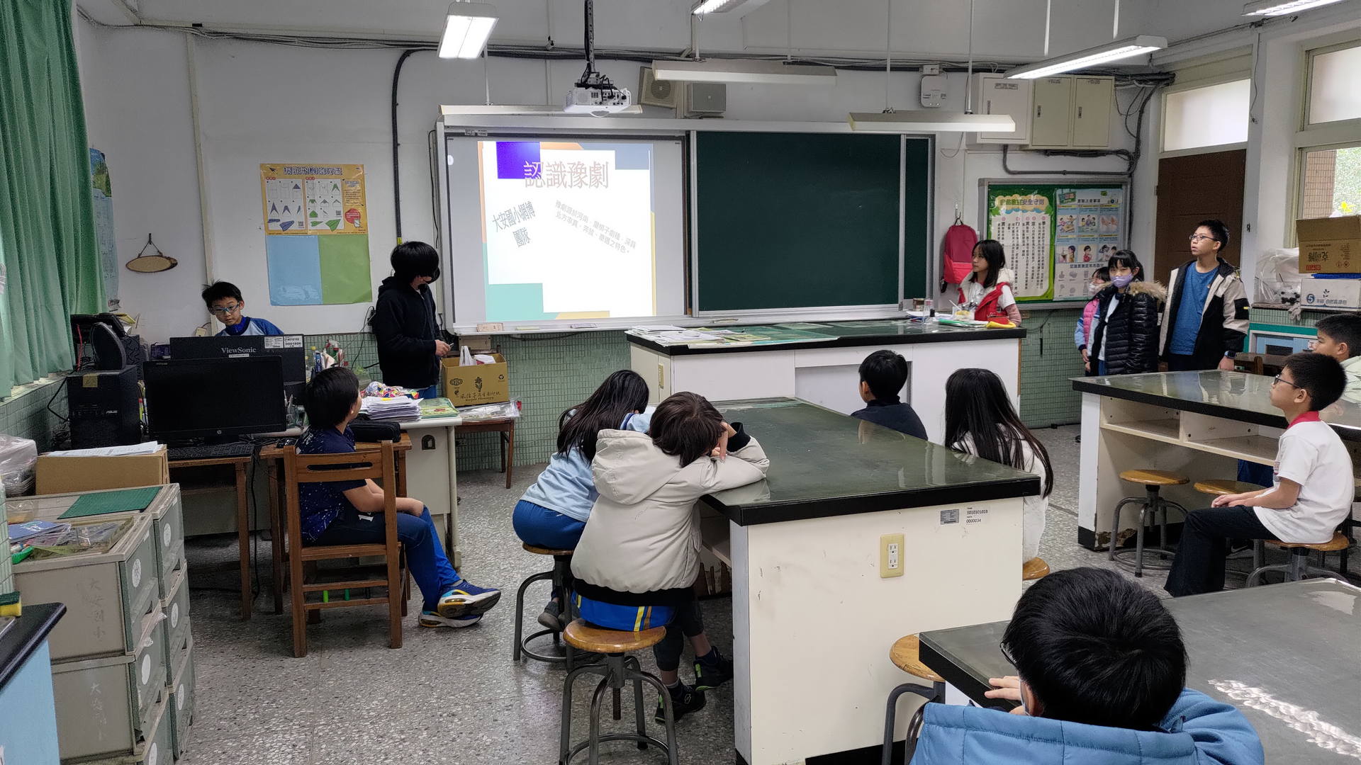 The students listened attentively to the presentation content.