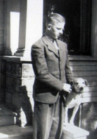 Dr. Noordhoff, graduating from high school, and his favorite dog Jack .(1944)