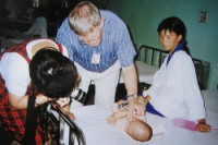 A visit to a little patient during the free medical service in Vietnam.